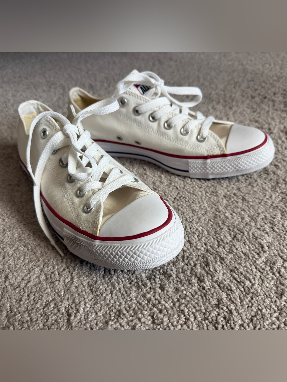 Converse Low-Top Canvas Sneakers in Off-White with Red Trim
